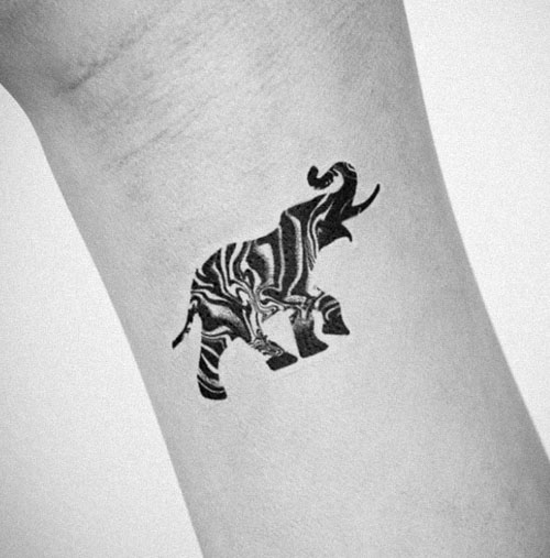 Annie Ilonzeh Elephant Wrist Tattoo | Steal Her Style