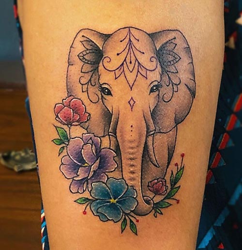 Elephant thigh tattoo