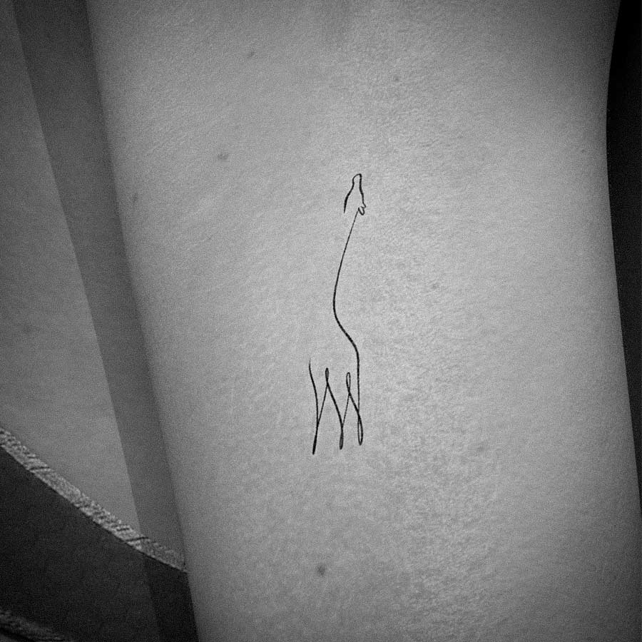 Tiny and Cute Giraffe Tattoo Design