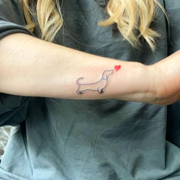 dachshund line art tattoo side arm