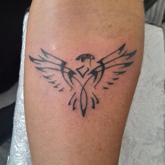 tribal eagle arm tattoos