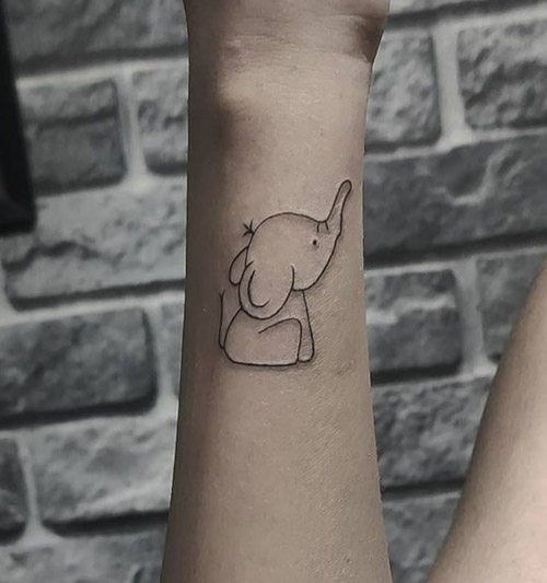 30+ Adorable Tiny Elephant Tattoos | Spiritus Tattoo | Small wrist tattoos, Elephant  tattoo small, Elephant tattoo design