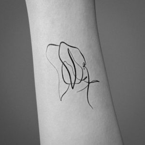 Elephant tattoo in one line on the arm