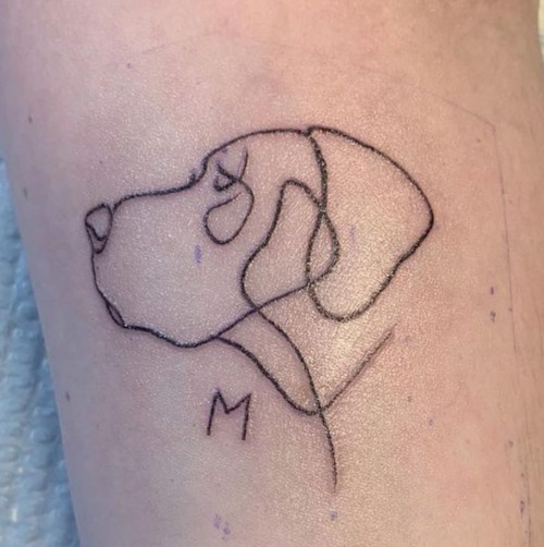 I wanted an abstract dog tattoo but cruel trolls say my prized inking looks  more like contraception  The Irish Sun
