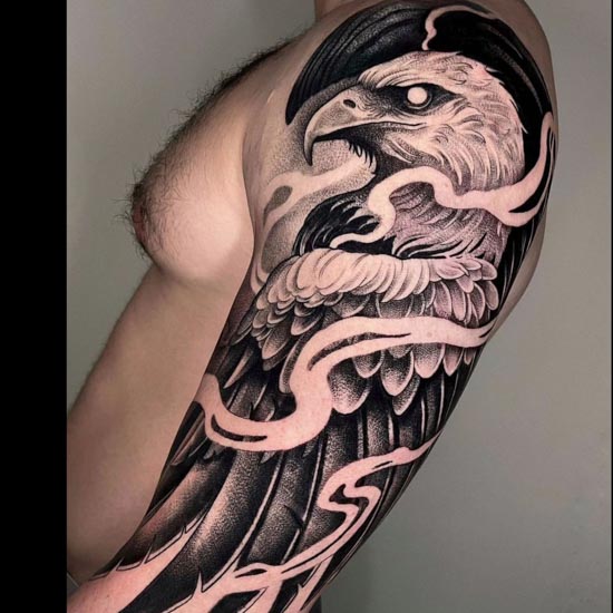Traditional style eagle tattoo located on the shoulder.