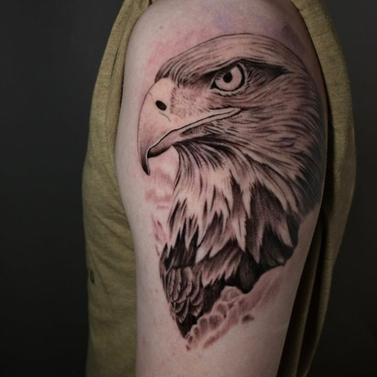 large detailed eagle head tattoo on arm