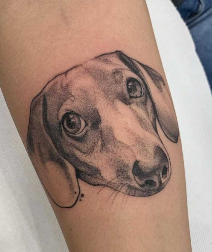 large tattoo of dachshund head