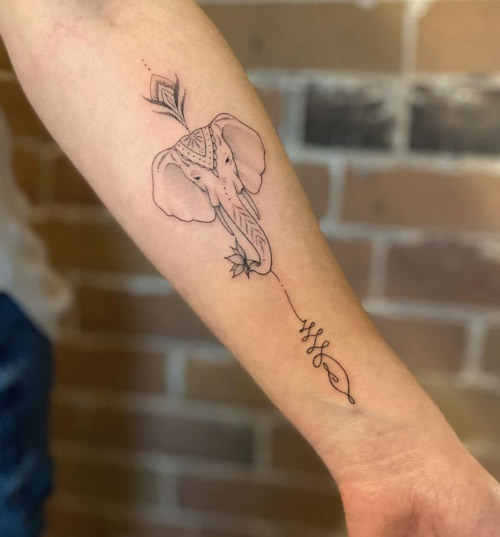 Little Tattoos  Graphic style elephant tattoo on the left forearm