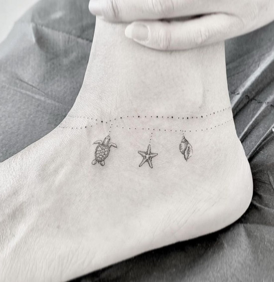 simple starfish tattoo on foot