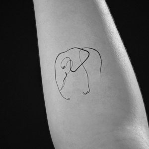 small elephant line tattoo