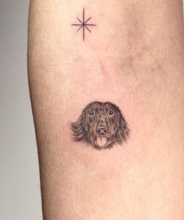 small wiener dog head portrait tattoo