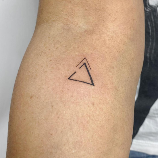 triangle geometric tattoo minimal