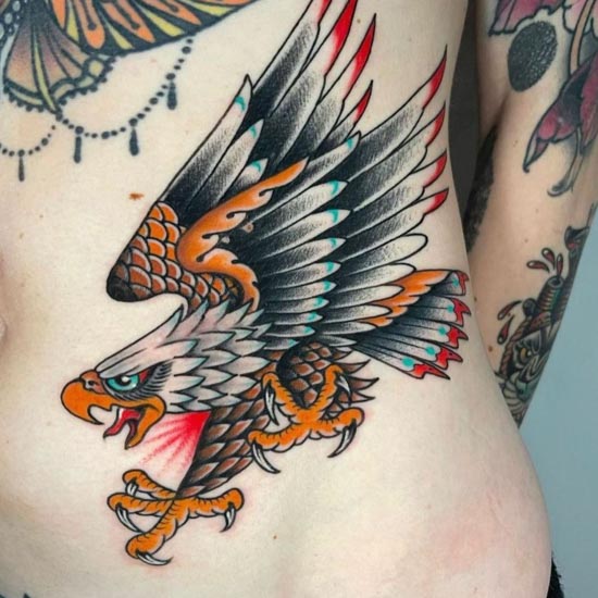 a flamin' hot eagle done on myself by myself j. kirsch [@beepingfinch on  instagram] at sinful art tattoo in clayton nj : r/traditionaltattoos